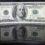 U.S. 'fiscal bazooka' blows dollar a little lower