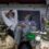 Two to a bed in Delhi hospital as India's COVID crisis spirals