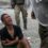 Spain accuses Morocco of blackmail as crying migrant boy seen in desperate bid to enter EU