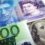 Dollar on course for weekly gain; kiwi leaps with inflation