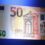Euro slips, dollar edges higher in see-saw trading