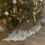 Horror moment huge rat scurries from under Christmas tree in front of family